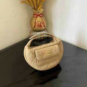 Replica Chanel Mini Round Matelassé Handbag - Luxury Quilted Cowhide Design