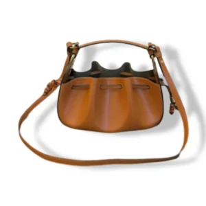 Discover the Fendi Pomodorino Mini Bucket Bag Replica in premium cowhide leather with gold hardware. A luxury drawstring bag perfect for style and functionality, ideal for any occasion.