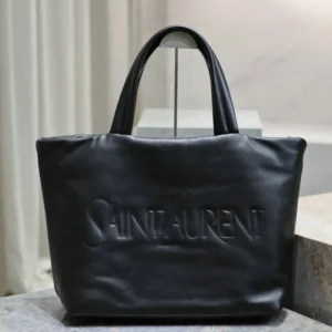 Saint Laurent Logo-Debossed Leather Tote Bag Mirror (1:1) – A luxury black lambskin handbag with a spacious interior, elegant design, and debossed logo detail.